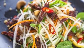 Capture the savory essence of Hanoi’s street food gem